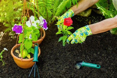 Workers and landscaping equipment symbolising ethical labour standards